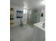 Updated bathroom featuring stone shower and modern fixtures at 409 N Finch Ave, Lafayette, CO 80026