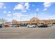Exterior shot of a busy King Soopers Marketplace shopping center on a sunny day at 10224 Worchester St, Commerce City, CO 80022