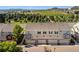 Townhome complex featuring neutral siding, black shutters, and well maintained landscaping at 1522 Chimney Peak Dr, Castle Rock, CO 80109
