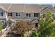 Charming townhome with inviting curb appeal and well-maintained landscaping at 1522 Chimney Peak Dr, Castle Rock, CO 80109