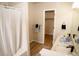 Well-lit bathroom with a shower-tub combo and modern vanity at 6845 S Webster St # E, Littleton, CO 80128