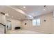 Spacious finished basement area with recessed lighting, neutral carpet, and a window, ideal for entertainment at 917 White Leaf Cir, Castle Rock, CO 80108
