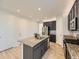 Bright kitchen with an island, granite countertops, and modern appliances at 917 White Leaf Cir, Castle Rock, CO 80108