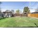 Spacious backyard with a shed and well-maintained lawn at 3025 Forest St, Denver, CO 80207