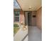 Welcoming home entryway with front door, brick facade, and golden retriever at 3025 Forest St, Denver, CO 80207
