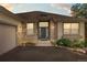 Charming Evergreen home featuring stone accents, a skylight, and an attached garage at 31042 Wildwoods, Evergreen, CO 80439