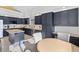 Spacious kitchen with a center island, desk space, and stainless steel appliances at 31042 Wildwoods, Evergreen, CO 80439