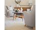 Close-up of a cozy living room featuring comfortable seating, stylish decor, and a coffee table centerpiece at 6463 S Vance St, Littleton, CO 80123