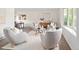 Cozy living room with comfortable seating, a large window, and stylish decor, creating a welcoming ambiance at 6463 S Vance St, Littleton, CO 80123