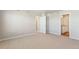 Neutral bedroom featuring plush carpet, base-board heating and ample space for furniture at 48255 Shetland Dr, Bennett, CO 80102