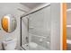 Bathroom with tile shower, wood vanity and a large mirror at 107 N Harris St # 102, Breckenridge, CO 80424