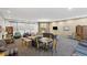 Condo clubhouse featuring cozy seating, stone fireplace, mounted TV, and natural wood wall accents at 107 N Harris St # 102, Breckenridge, CO 80424