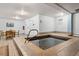 Indoor spa and sitting area with tile flooring, neutral paint, and modern lighting at 107 N Harris St # 102, Breckenridge, CO 80424