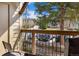 Balcony view overlooking a street with cars and mountain scenery at 107 N Harris St # 102, Breckenridge, CO 80424