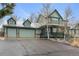 Charming two-story home featuring a three-car garage, covered porch, and lovely curb appeal at 925 Antelope W Dr, Bennett, CO 80102