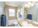 Cozy bathroom with a shower-tub combination and a vanity with sink and countertop space at 87 Macon Ct, Aurora, CO 80010