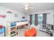bedroom featuring natural light, loft bed, and storage at 87 Macon Ct, Aurora, CO 80010