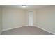 Neutral carpeted bedroom features a built in closet at 87 Macon Ct, Aurora, CO 80010