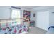 bedroom with natural lighting and closet for storage at 87 Macon Ct, Aurora, CO 80010