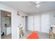 A bedroom has a full bathroom and spacious closets at 87 Macon Ct, Aurora, CO 80010
