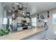 Bright kitchen featuring stainless steel appliances and bar with space for seating at 87 Macon Ct, Aurora, CO 80010