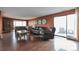 Cozy living room with hardwood floors, balcony access, and natural light at 3131 E Alameda Ave # 704, Denver, CO 80209