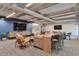 Cozy lounge with comfortable seating, large TV, and stylish decor at 3131 E Alameda Ave # 704, Denver, CO 80209