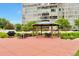 Outdoor patio featuring a gazebo, seating, and a grill with views of the surrounding area at 3131 E Alameda Ave # 704, Denver, CO 80209