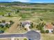 An aerial view showcases the home's location amid a beautiful, sprawling landscape at 3221 Autumn Sun Cir, Castle Rock, CO 80104