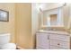 Bathroom featuring a vanity, framed mirror and toilet at 3221 Autumn Sun Cir, Castle Rock, CO 80104