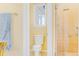 Bathroom featuring a glass-enclosed shower and natural light from window at 3221 Autumn Sun Cir, Castle Rock, CO 80104