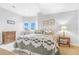 Bright and airy bedroom with natural light and a neutral color palette at 3221 Autumn Sun Cir, Castle Rock, CO 80104