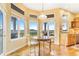 This bright breakfast nook provides stunning views at 3221 Autumn Sun Cir, Castle Rock, CO 80104