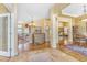 Open foyer with hardwood floors, decorative lighting, and views to other rooms at 3221 Autumn Sun Cir, Castle Rock, CO 80104