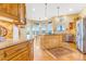 This kitchen has stainless steel appliances and a breakfast bar at 3221 Autumn Sun Cir, Castle Rock, CO 80104