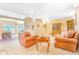 Spacious living room with large windows and comfortable seating area at 3221 Autumn Sun Cir, Castle Rock, CO 80104