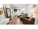 Comfortable living room with stylish decor, hardwood floors, and ample natural light, perfect for modern living at 2026 S Lincoln St, Denver, CO 80210