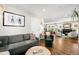 Cozy living room with plush seating, hardwood floors, and stylish decor, creating a comfortable and inviting space at 2026 S Lincoln St, Denver, CO 80210