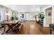 Bright, open living room with hardwood floors, natural light, and a view of the entryway at 2026 S Lincoln St, Denver, CO 80210