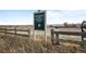 Standley Lake Regional Park neighborhood sign is surrounded by native grasses and walking paths at 9560 W 104Th Ave, Broomfield, CO 80021