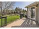 Relaxing wooden deck in a fenced backyard, perfect for outdoor gatherings at 9605 Elk Mountain Cir, Littleton, CO 80125