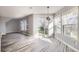Inviting dining area with sliding door access to the outdoor deck and backyard at 9605 Elk Mountain Cir, Littleton, CO 80125