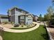 Landscaped backyard with artificial turf and patio at 1665 Diamond Head Dr, Castle Rock, CO 80104