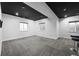 Open basement living space with three windows at 1665 Diamond Head Dr, Castle Rock, CO 80104