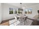 Bright dining area next to a modern open-plan kitchen at 1665 Diamond Head Dr, Castle Rock, CO 80104