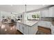 Open concept kitchen with granite countertops and hardwood floors throughout at 1665 Diamond Head Dr, Castle Rock, CO 80104