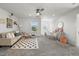 Bright living room features a cozy couch, playful decor, and a comfortable rug, creating an inviting space at 1665 Diamond Head Dr, Castle Rock, CO 80104