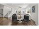 Bright, modern living room featuring hardwood floors, neutral tones, and stylish decor at 1665 Diamond Head Dr, Castle Rock, CO 80104