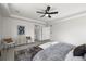 Comfortable main bedroom featuring a seating area and neutral tones at 1665 Diamond Head Dr, Castle Rock, CO 80104