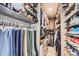 Walk-in closet with lots of shelving and hanging storage options at 10991 Xanadu St, Commerce City, CO 80022
